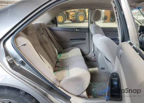 2006 Toyota Camry Le z USA, uszkodzony, nr VIN JTDBE32K563047994